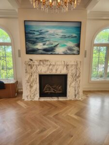 Stone fireplace with decorative mantel in Cincinnati home