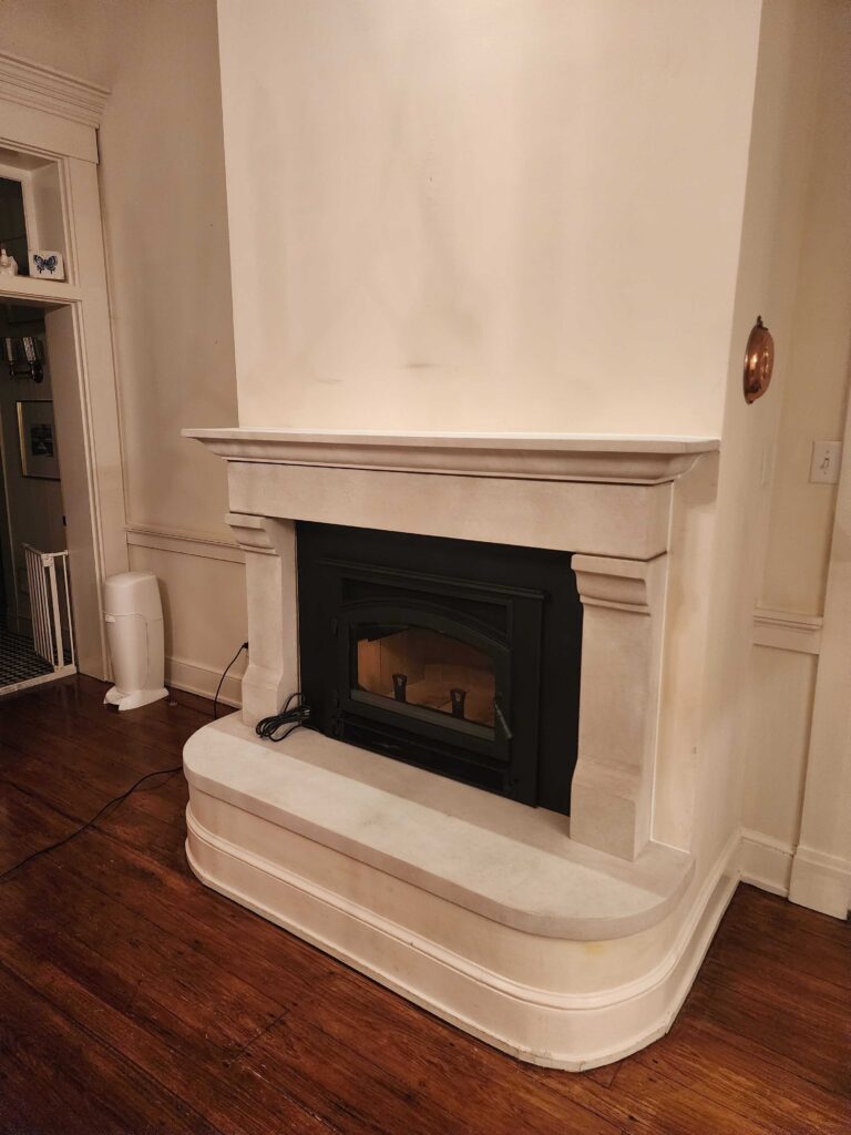 Fireplace mantel and surround during inspection assessment