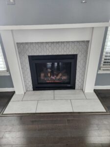 Gas fireplace insert inspected during chimney inspection