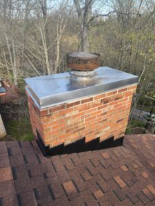 Metal chimney chase cover during Level 2 inspection in Cincinnati